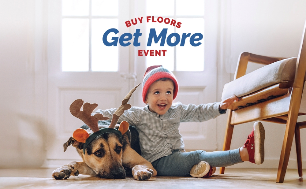 kid and dog sitting on luxury vinyl floor